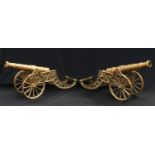 A pair of brass desk cannons, 44cm long (2)