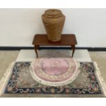 A Chinese deep pile woollen rug / carpet, woven in shades of dove grey, blue, and pink, 190cm x