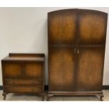 A 1950’s oak double wardrobe and matching cabinet chest, carved Greek-key decoration to each,