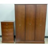 A G-Plan triple wardrobe, and a conforming G-plan tall chest of drawers, five graduated short