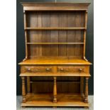 A Pollard Oak Welsh Dresser in the manner of Rupert Griffiths, two tier plate rack top, pair of