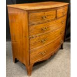 A George III mahogany bow-front chest of drawers, walnut cross-banded top, two short, above three