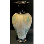 A Lovatts Langley vase, decorated in green, white and gilt lace panel designs, 46cm high