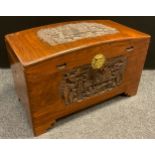 A 20th century Carved Camphor wood blanket chest, Chinoiserie style carving, brass lotus form