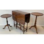 An Edwardian mahogany Pembroke table, canted rectangular top, turned legs, 65.5cm high x 62cm x 87cm