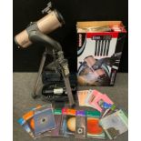 A Tasco Starguide 114mm reflector telescope, boxed with stand; Vision king astronomical telescope;