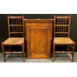 A pair of 19th century oak spindle-back side chairs, woven rush seats, turned stretchers and legs,