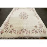 A large woollen rug / carpet, 444cm x 371cm.