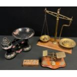 A set of Victorian Postage scales, brass mechanism, serpentine oak base; a set of painted Avery