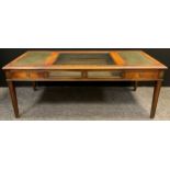 A 20th century mahogany Bijouterie centre coffee table, tooled green leather inset top, lift-up