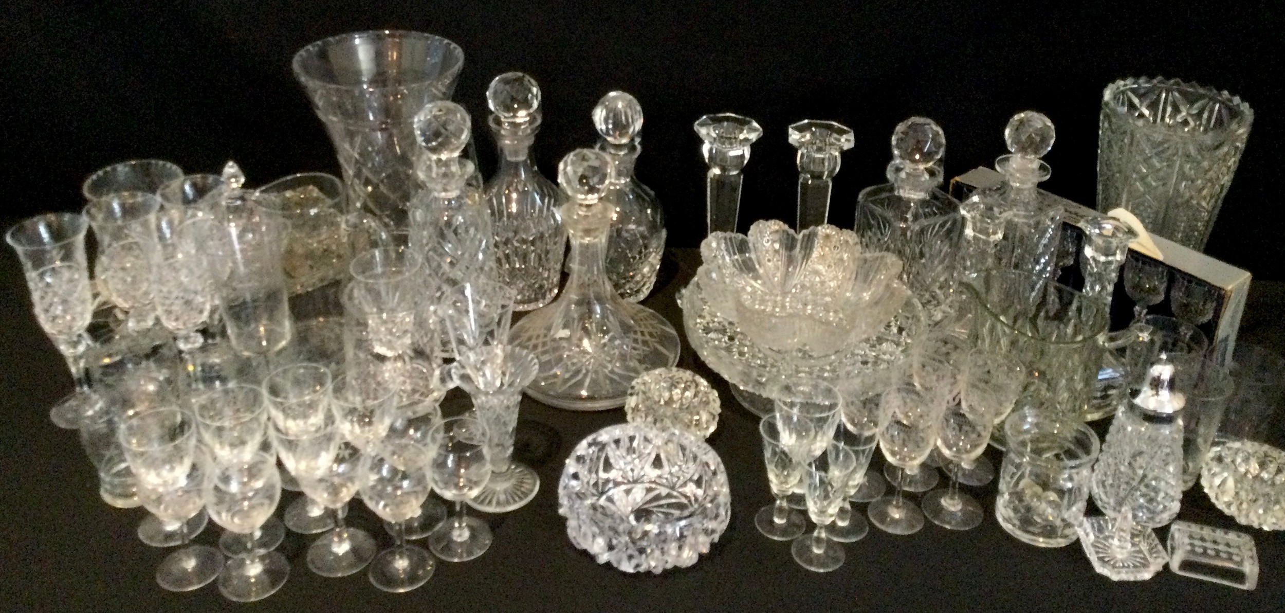 Glass ware - 19th century spirit bottle decanters, pair of faceted candle sticks, set of four cut