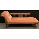 A Victorian oak scroll-end Chaise Longue, carved scroll, turned supports with ceramic casters,