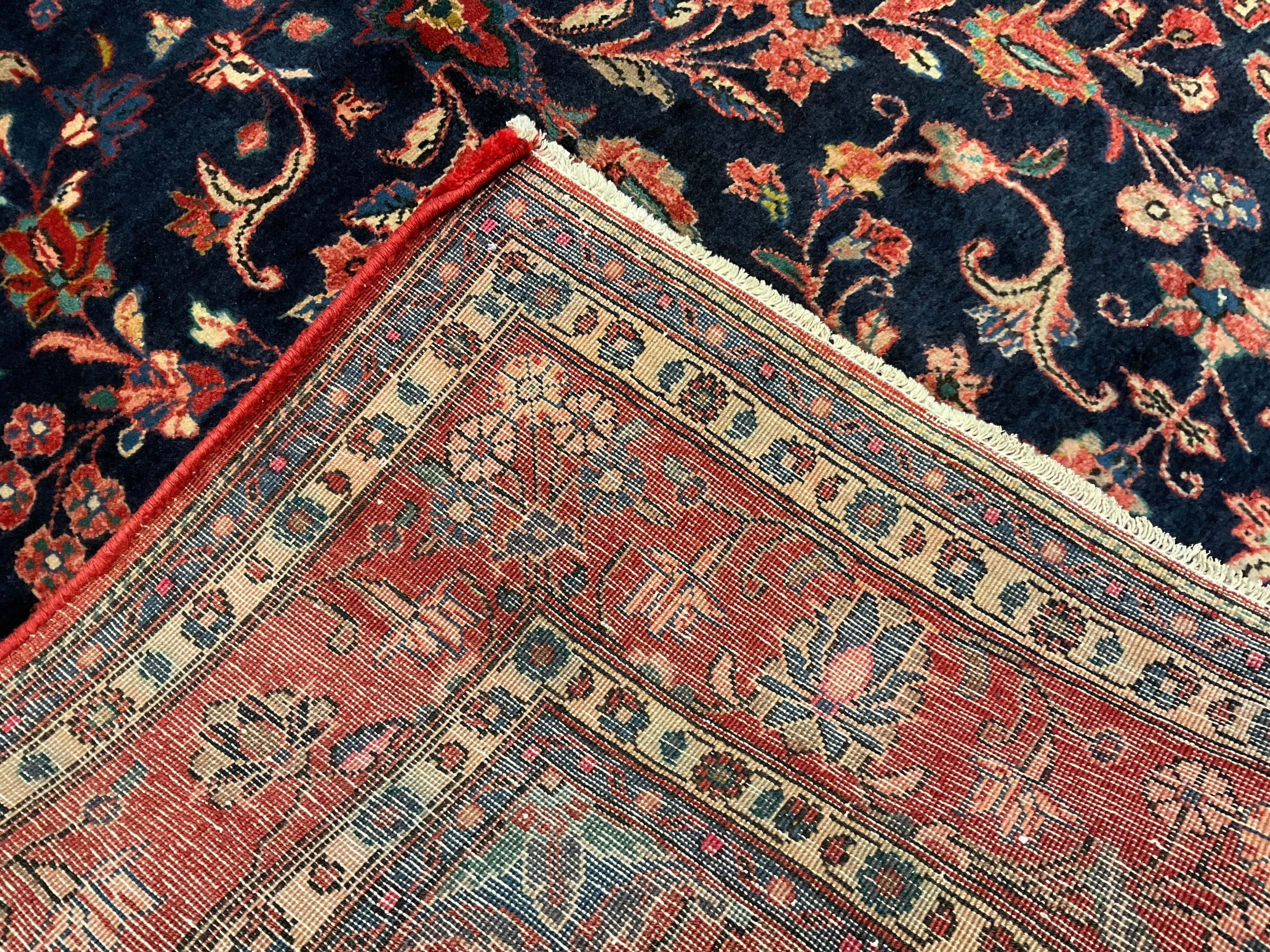 A central Persian Sarouk carpet, hand-knotted with a central lotus form medallion, within a stylised - Image 3 of 3