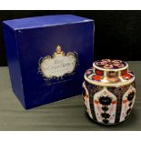 A Royal Crown Derby 1128 Imari Ginger jar and cover, boxed.