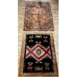 A Middle Eastern rectangular woollen rug or carpet, stylised geometric motifs and animals, in