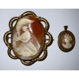 A Victorian oval shell cameo brooch, carved with a classical beauty feeding an eagle, in a Pinchbeck