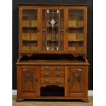 An Arts & Crafts oak dog kennel dresser or side cabinet, 204.5cm high, 152cm wide, 45cm deep,
