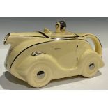 An Art Deco teapot, modelled as a racing car, 23cm long