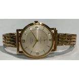 A Zefyr 9ct gold watch, champagne dial, baton and Arabic numerals, subsidiary seconds dial, with