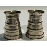 A pair of Edwardian silver novelty salt and pepper pots, as coopered barrels, 5cm, Birmingham 1904