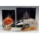 A Royal Crown Derby paperweight, Woodland Badger, gold stopper, boxed; another, Red Squirrel, gold