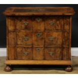 An 18th century design walnut arc-en-arbalète chest, oak featherbanded top above three long drawers,