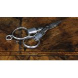 A pair of Victorian silver patent travelling scissors, folding for the pocket or chatelaine, 9cm