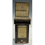 A novelty tinplate moneybox, as a Radiation Junior gas cooker, 21cm high