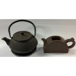 A Chinese cast iron kettle and stand; a Yixing teapot (lacking cover) (2)