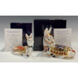 An associated pair of Royal Crown Derby paperweights, Thistle Donkey, Govier's exclusive 2001 annual
