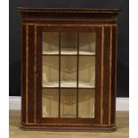 A George III mahogany glazed corner cabinet, 98cm high, 82.5cm wide, 44cm deep