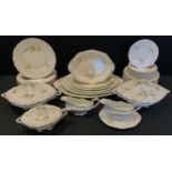 An Edwardian Broomfield & Gater of Handley, dinner set, comprising graduated meat plates, tureens,