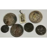 An American silver dollar, 1922; another 1923; a George III cartwheel penny, 1797; a silver pendant,