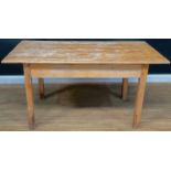 A pine farmhouse kitchen table, 75cm high, 147cm wide, 77cm deep