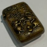 A Japanese brass novelty vesta case, embossed with a rat and a monkey drinking, Meiji