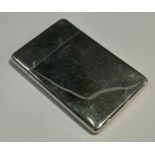 A George V silver rounded rectangular visiting card case, of plain design, 10cm, London 1910, 84.5g