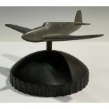A pewter desk weight, WWII plane, domed base, 10cm high