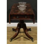 A George IV mahogany Pembroke table, of unusually long proportions, rounded rectangular top with