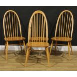 A set of four Ercol Windsor Quaker dining chairs, 99.5cm high, 45cm wide, the seat 37cm deep (4)