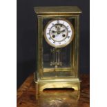 A late 19th century French lacquered brass four glass mantel clock, 9.5cm dial with Arabic chapter