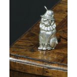 A silver novelty vesta case, cast as Mr Punch’s Dog Toby, 5.5cm long, marked Sterling