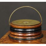 An early 19th century fruitwood and brass circular carriage foot warmer swing carrying handle, 27.