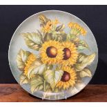 An Aesthetic Movement circular charger, painted by F Cridland, signed and dated March 10th 1882,