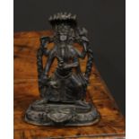 Indian School (19th century), a dark patinated bronze shrine figure, of Ganesh, rounded