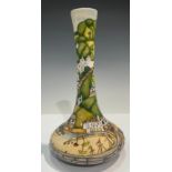 A Moorcroft Clovelly pattern bottle vase, designed by Paul Hilditch, signed, limited edition 8/