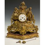 A 19th century French gilt spelter figural mantel clock, on shaped gilt wood base