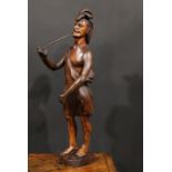 A 19th century carved tobacconists advertising figure as a native American, standing wearing