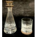 An Elizabeth II silver mounted clear glass conical decanter and whisky tumbler, Broadway & Co.