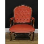 A Victorian rosewood button back nursing armchair, 88cm high, 65cm wide, the seat 53cm wide and 51cm