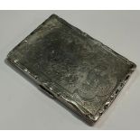 A Victorian silver shaped rectangular card case, engraved with a classical pedestal urn, leafy